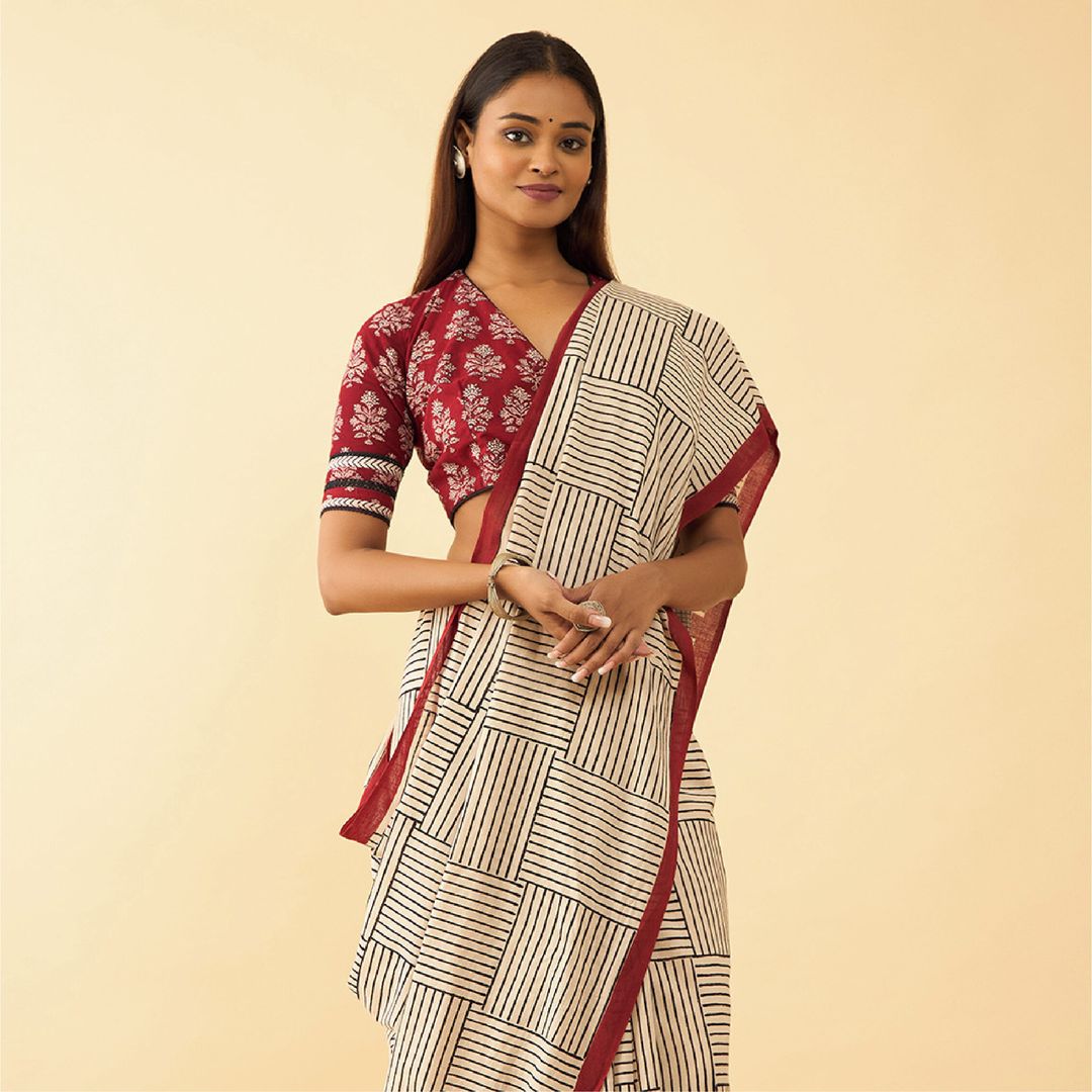A Khadi saree that captivates the eye and challenges perception. This piece marries tradition with avant-garde design, c...