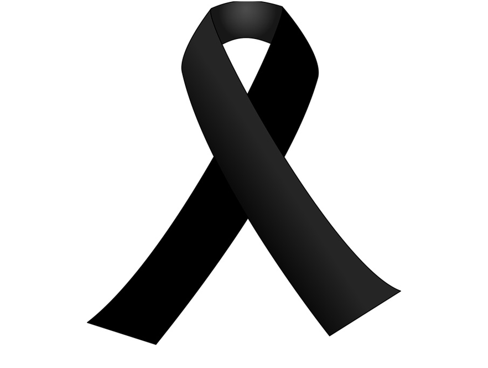 Lazo negro sobre fondo blanco, símbolo de luto oficial